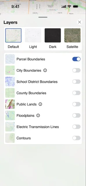 Layers sheet with four base map thumbnails and eight data layer toggles, Parcel Boundaries enabled